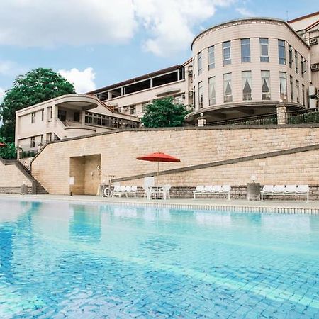 Апартаменты San Yu Health Center Юйчи Экстерьер фото
